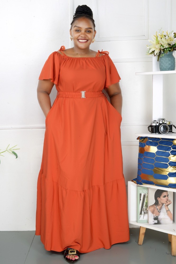 orange dress for ladies and women located in Gudele for more information about the product and delivery contact Sunday on 0925235760