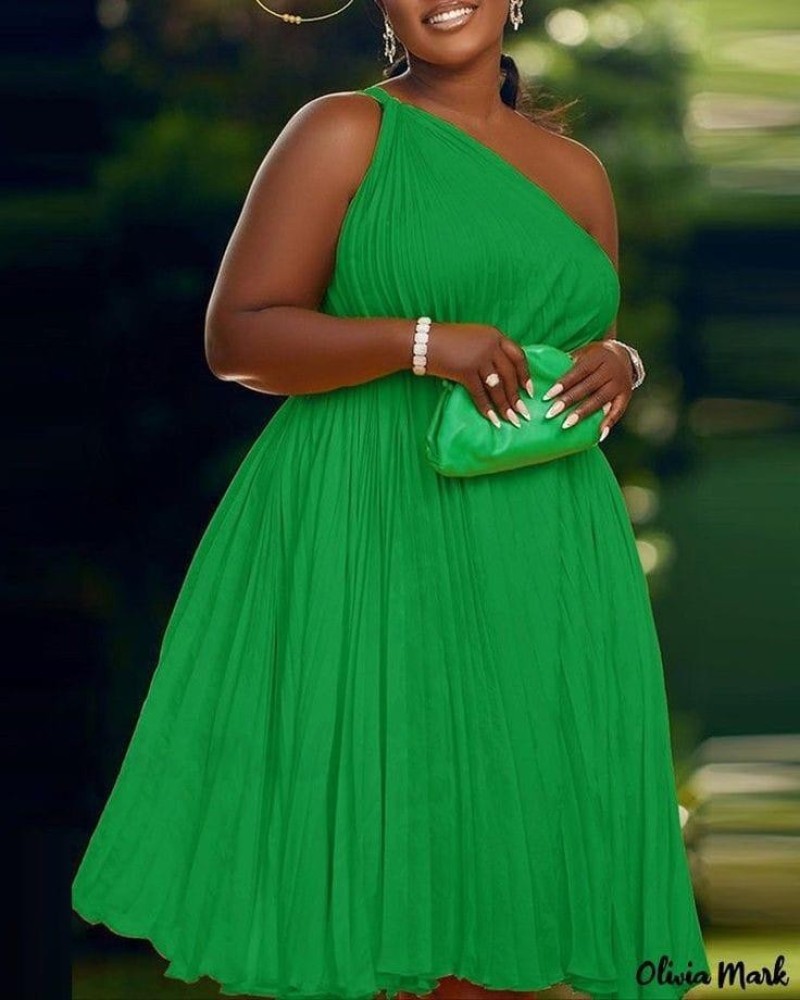 ladies dress green and slicky with hand bag call muna on 09 1046270043 for your oeder