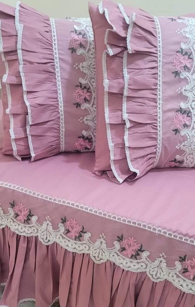 pink bed sheet and pillow covers