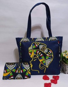 Dark denim African hand Bag with a straps for both hand and shoulder.