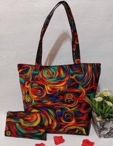 Kitenge hand bag with straps for both hand and shoulder with a mini bag