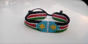 Beaded bracelets with desired name, place or anything designed with South Sudanese flag