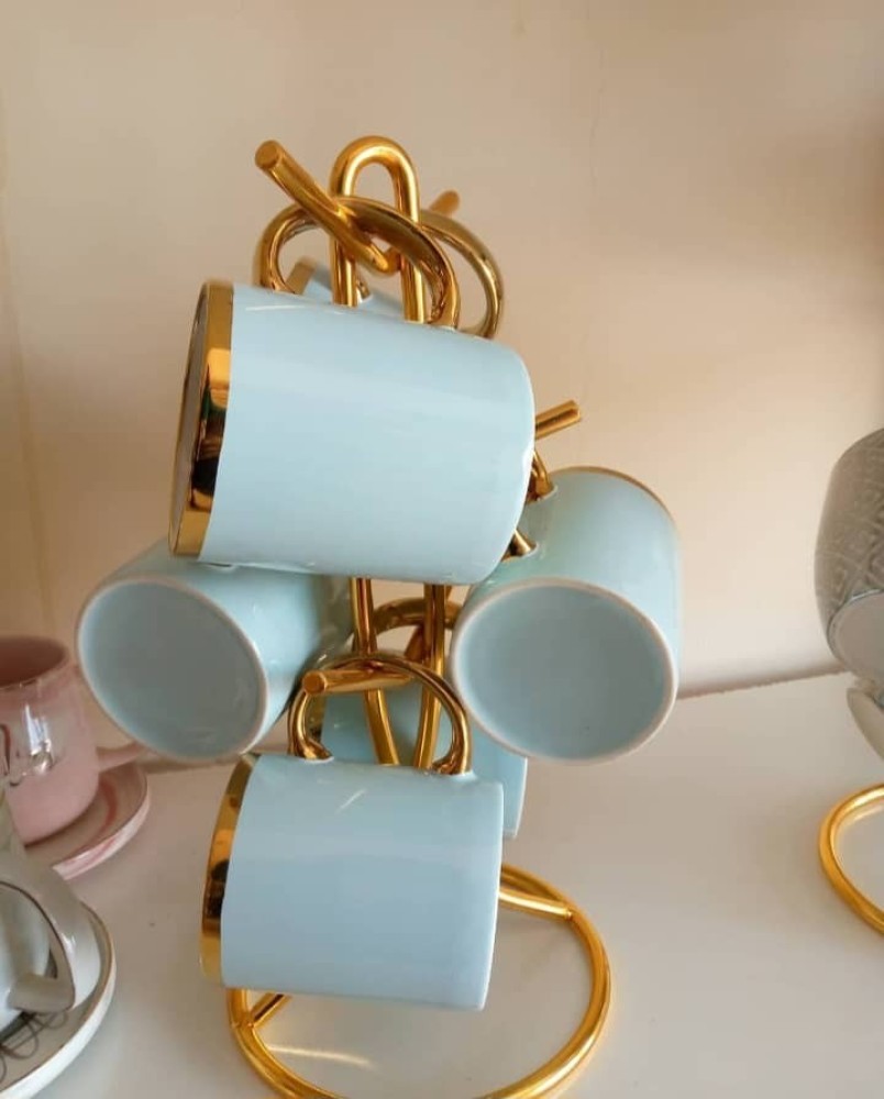 A set of tea mug  in color blue set is at 12 dollars, one is ay 2 dollars.