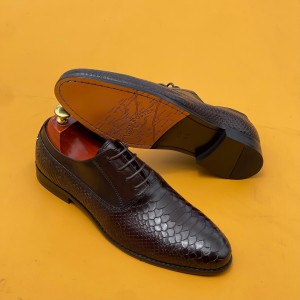 Leader shoes brown in color located in custom contact Lukudu on 092881 1289