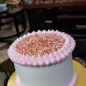 Medium size white and pink cream cake