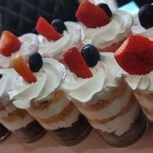 Cup cake with strawberry and cream