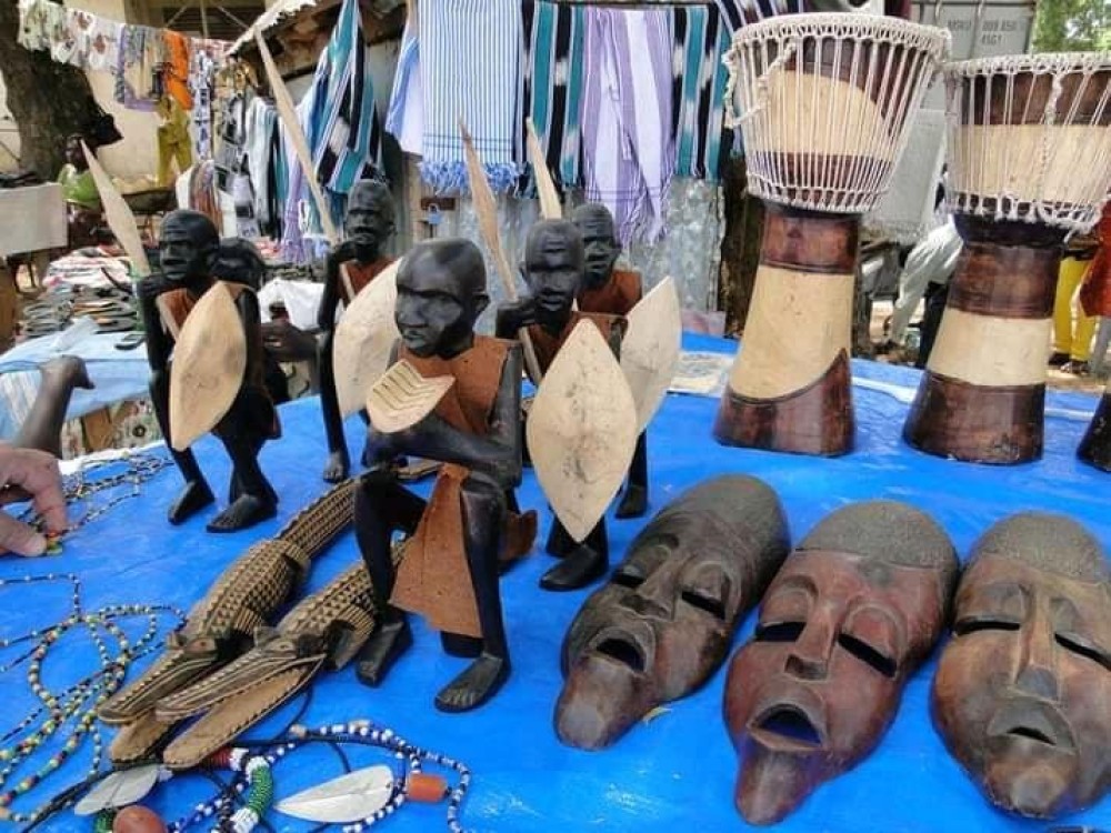 hand crafts dealing with Drums and human statue in juba town