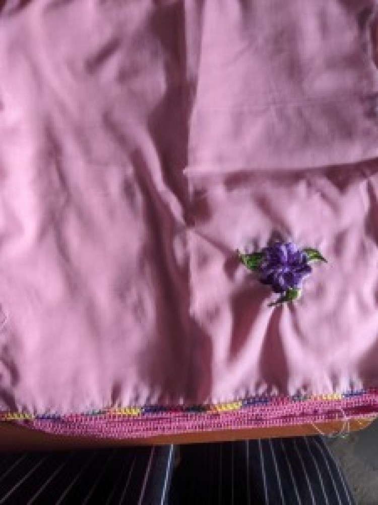 Wedding handkerchief, purple in color and designed with flower to the side of each.