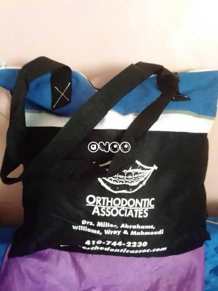 tote bag in purple and black color.