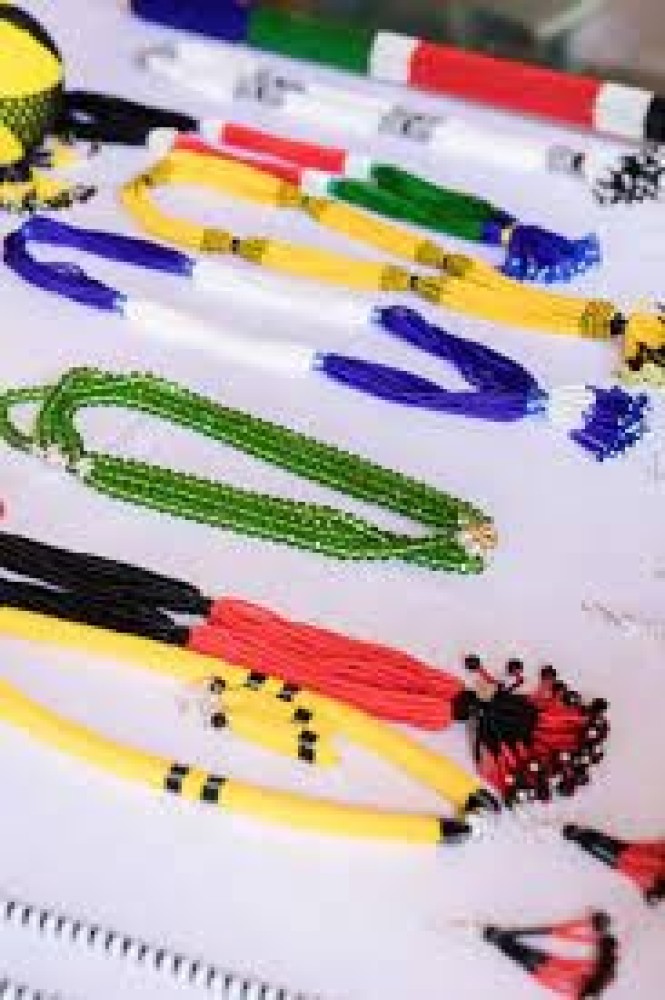 green, yellow, and red traditional bead for the neck one is 8000 ssp for order call a jack on 091905 5115