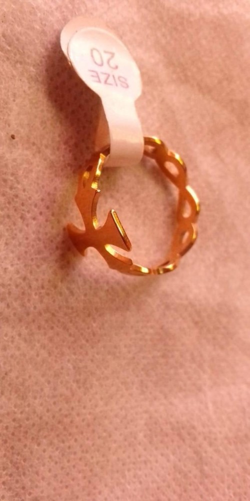 Golden ring designed with a cross available from size 16 to size 20